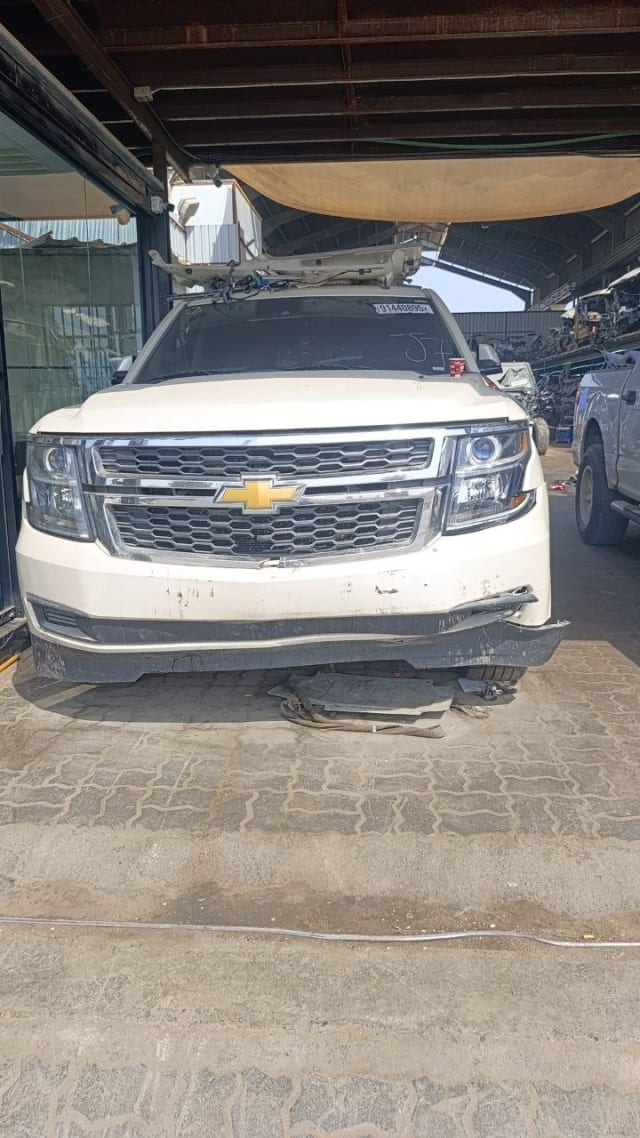 White Chevrolet Tahoe/Suburban front cut — bumper, chrome grille and headlights, Sharjah market