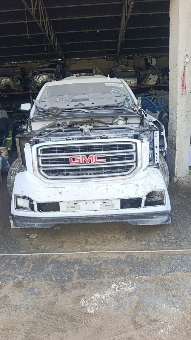 White GMC Yukon front halfcut — grille, bumper and radiator support, Sharjah market