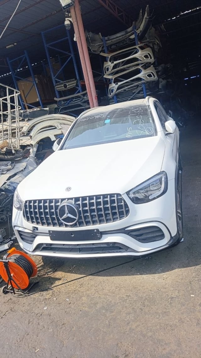 White Mercedes-Benz GLC X253 AMG front halfcut — bumper, grille and headlights, Sharjah market