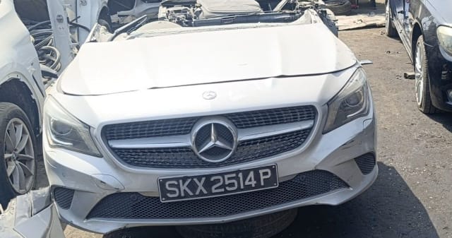 Silver Mercedes-Benz CLA front halfcut — bumper, diamond grille, headlights and hood, Sharjah market