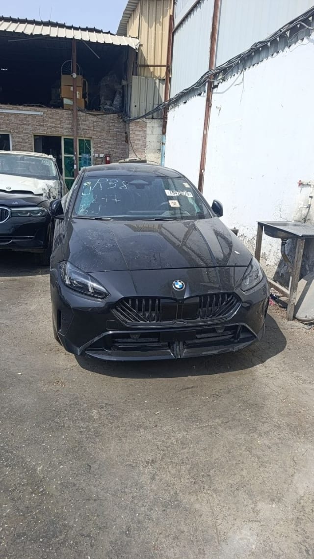 Dark grey BMW 1-Series front — bumper, kidney grille, headlights and hood, Sharjah market