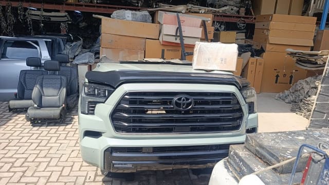 Light green Toyota Sequoia front halfcut — grille, bumper, headlights and hood, Sharjah market