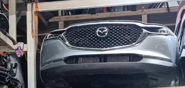 Silver Mazda CX-5 SUV front cut — bumper, grille and headlights, Sharjah market