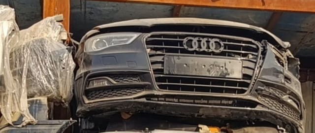 Dark grey Audi A3 front halfcut — bumper, single-frame grille and headlight, Sharjah market