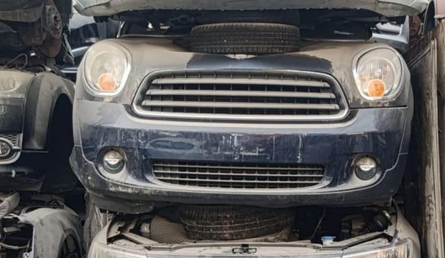 Dark blue MINI Cooper Countryman front halfcut — bumper, grille, headlights and fog lights, Sharjah market
