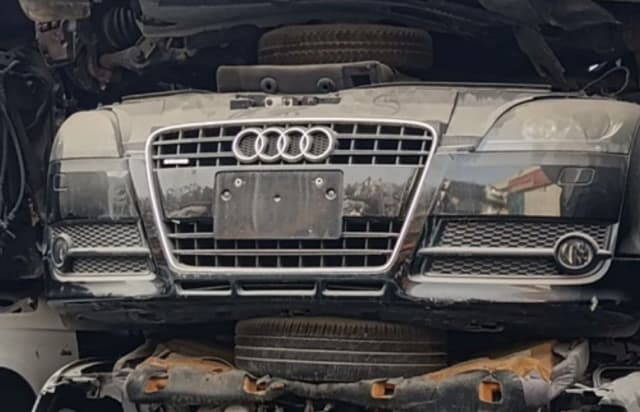 Dark grey Audi TT front cut — chrome grille, front bumper, headlights and fog lights, Sharjah market
