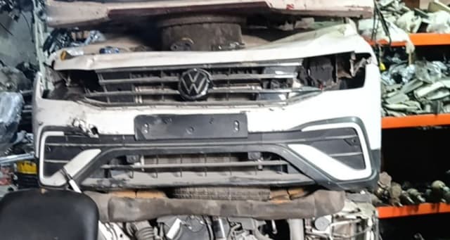 White Volkswagen Tiguan front halfcut — bumper, VW grille and radiator support, Sharjah market