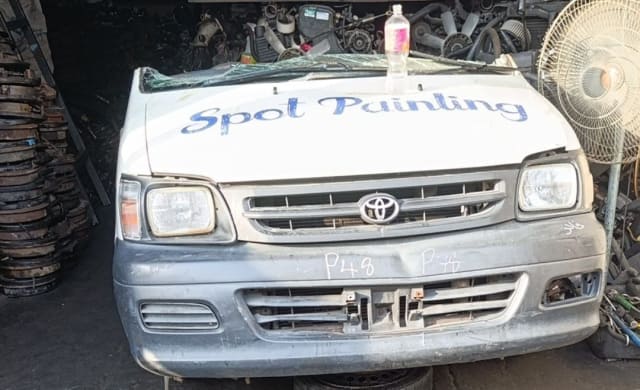 White Toyota Hiace van front halfcut — hood, grille, headlights and bumper, Sharjah market
