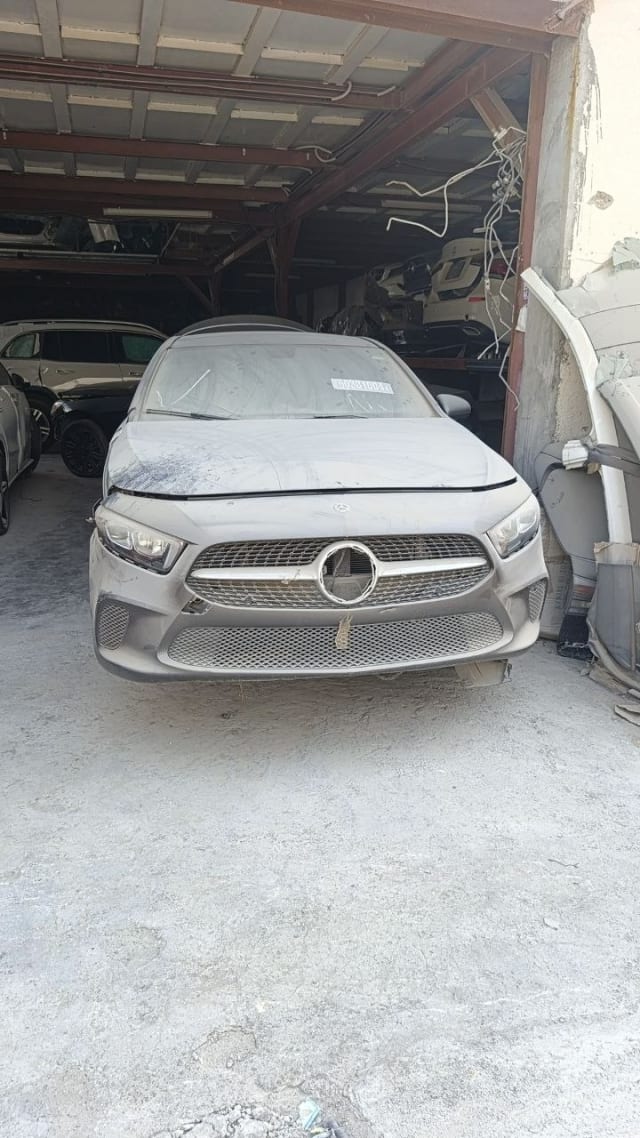 Grey Mercedes-Benz A-Class hatchback front — bumper, grille, headlights and hood, Sharjah market
