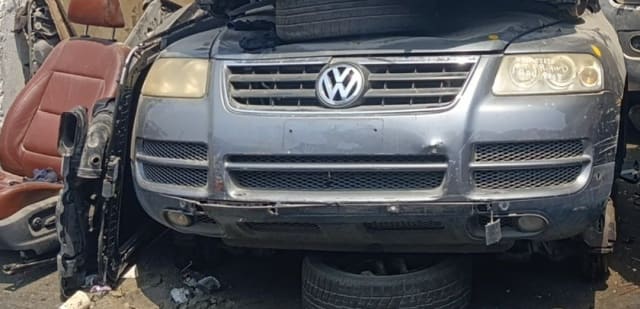Grey Volkswagen Touareg front halfcut — bumper, grille, headlights and hood, Sharjah market