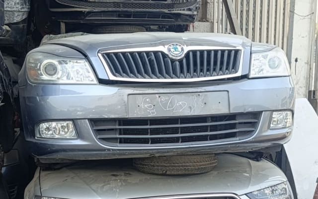 Light grey-blue Skoda Octavia front halfcut — bumper, grille, headlights and fog lights, Sharjah market