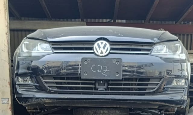 Black Volkswagen Golf front halfcut — bumper, grille, VW badge and headlights, Sharjah market
