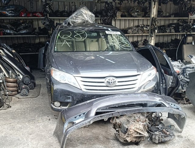 Dark grey Toyota Sienna minivan halfcut — hood, grille, headlights and front bumper, Sharjah market