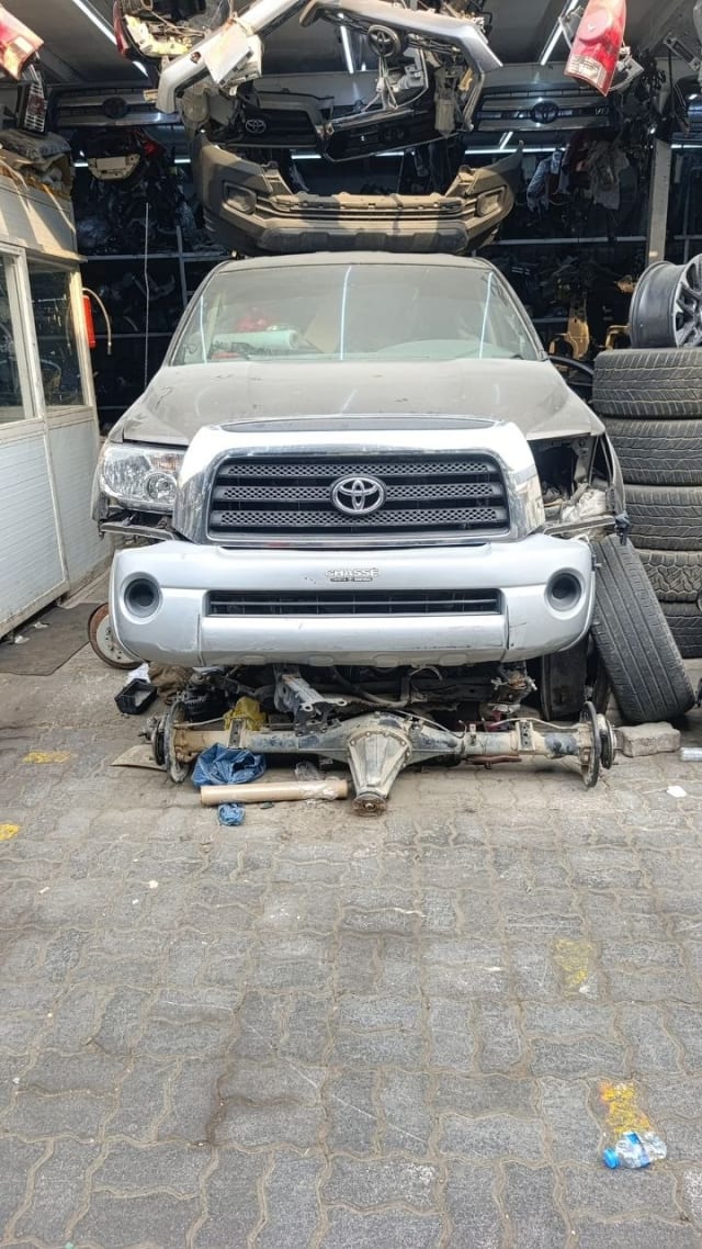 Silver Toyota Tundra front halfcut — bumper, chrome grille, headlights and hood, Sharjah market