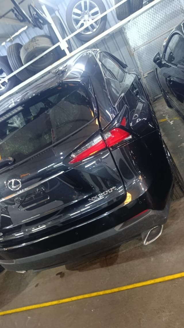 Black Lexus NX200t SUV rear halfcut — tailgate, rear bumper and tail lights, Sharjah market