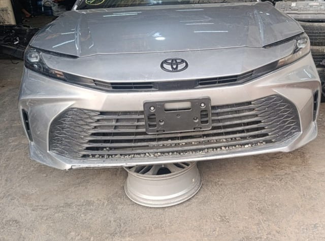 Silver Toyota Camry front cut — hood, bumper, grille and headlights, Sharjah market