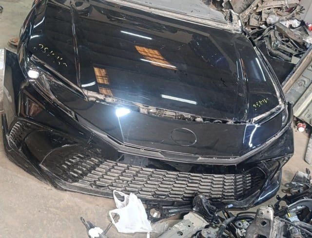 Black Toyota Camry front cut — hood, front bumper, mesh grille and headlights, Sharjah market