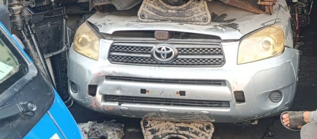 Silver Toyota RAV4 SUV front cut — bumper, grille and headlights, Sharjah market