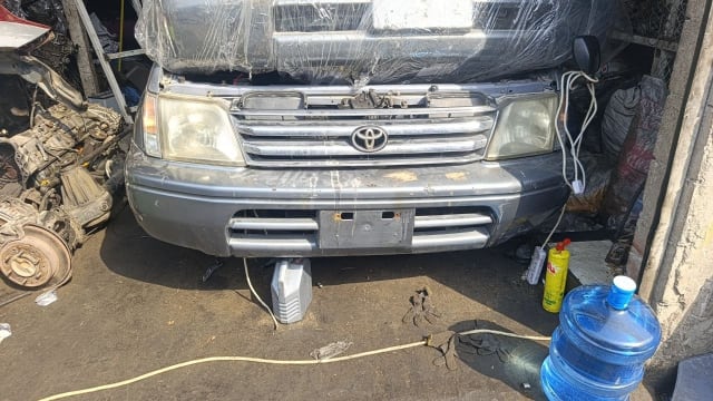 Dark grey Toyota Land Cruiser Prado front halfcut — bumper, grille and headlights, Sharjah market
