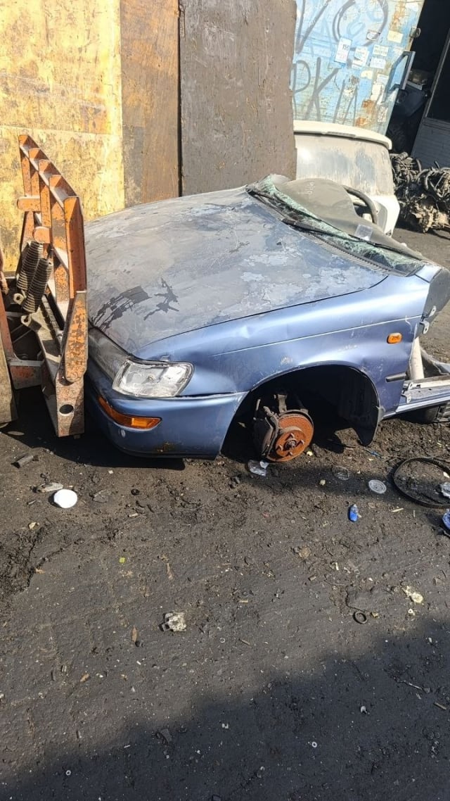Light blue Toyota Corolla front halfcut — hood, bumper, headlight and fender, Sharjah market