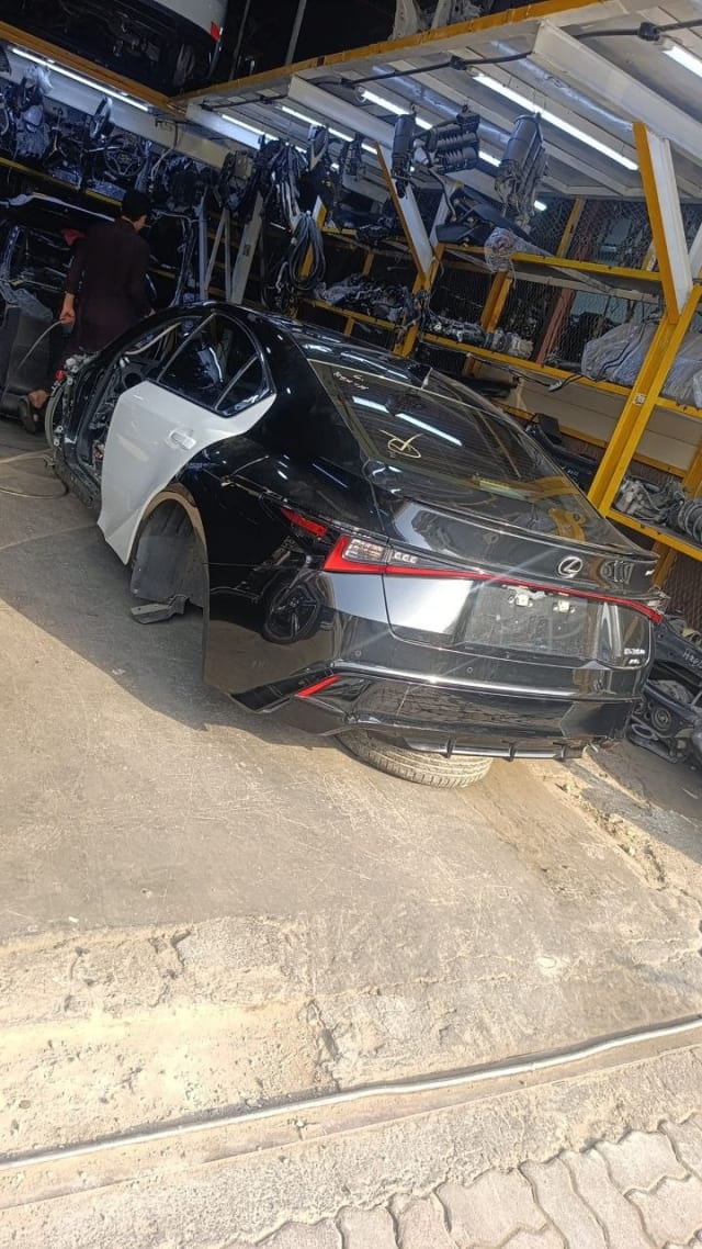 Black Lexus IS sedan halfcut — rear bumper, tail lights and trunk lid, Sharjah market
