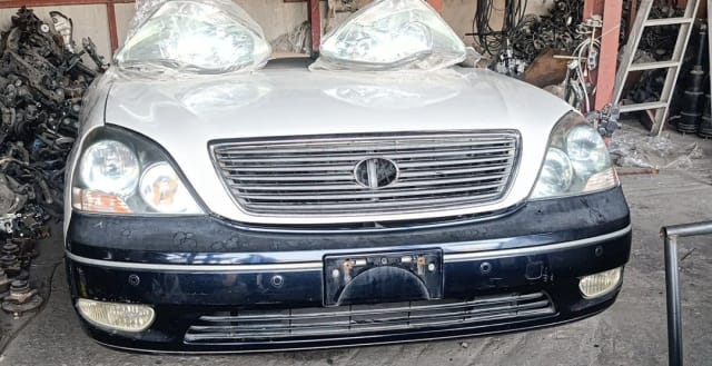 Silver Lexus LS430 sedan front cut — grille, headlights, hood and dark front bumper, Sharjah market