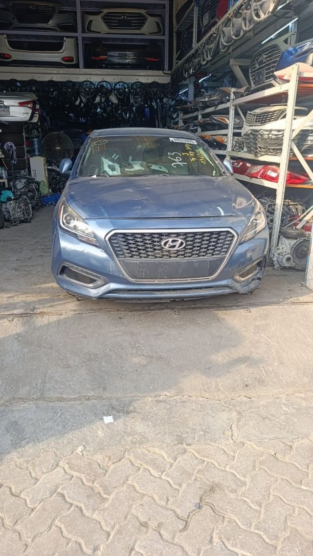 Blue-grey Hyundai Sonata sedan front halfcut — bumper, grille and headlights, Sharjah market