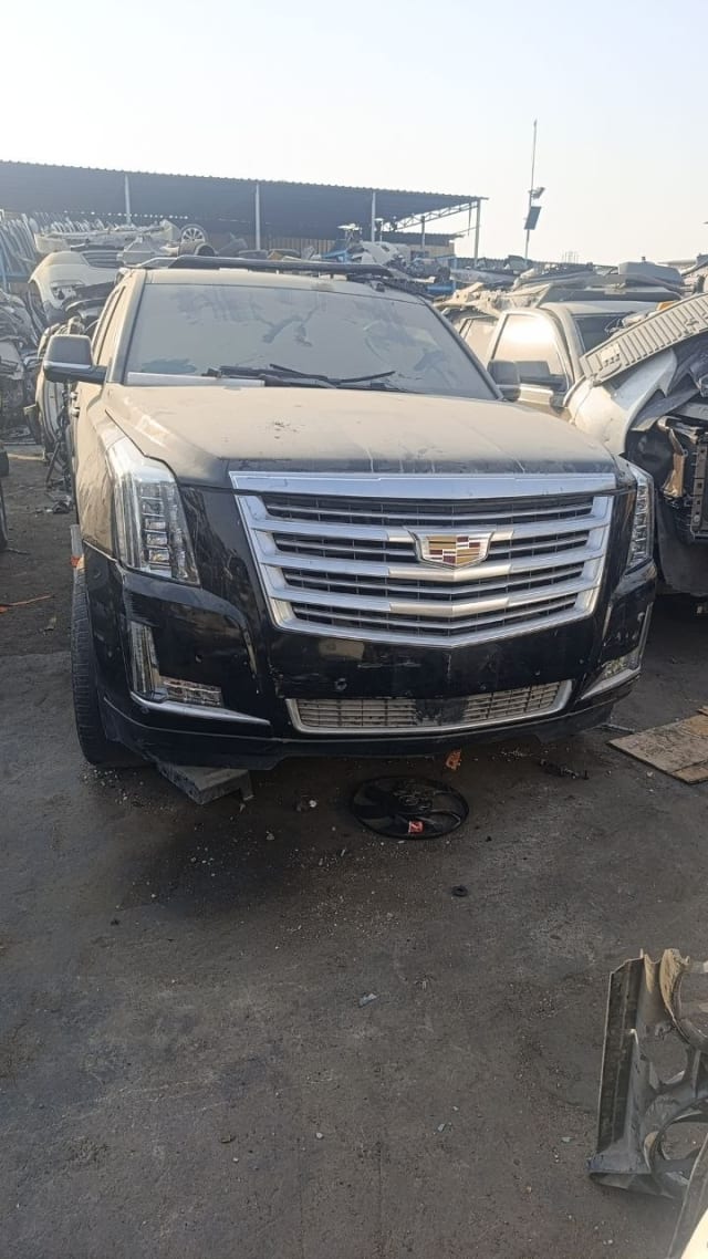 Black Cadillac Escalade SUV front cut — chrome grille, LED headlights, hood and bumper, Sharjah market