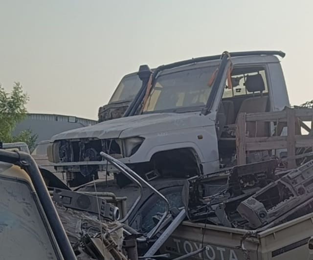 White Toyota Land Cruiser 70 Series pickup halfcut — front cab, doors and engine bay, Sharjah market