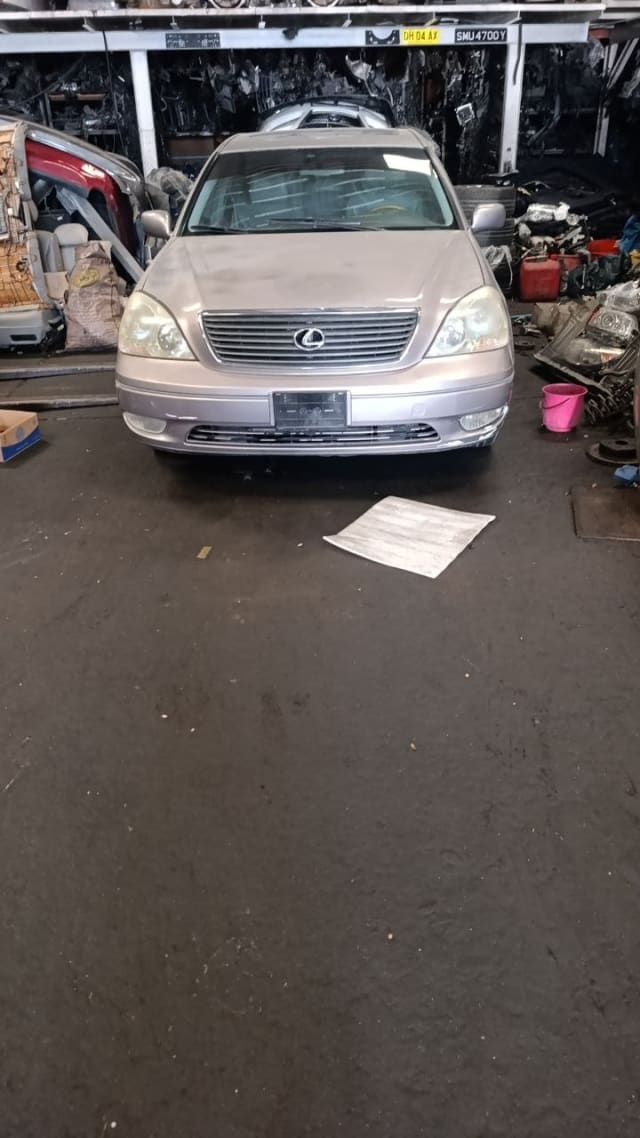 Beige Lexus LS430 sedan front view — bumper, grille and headlights, Sharjah market