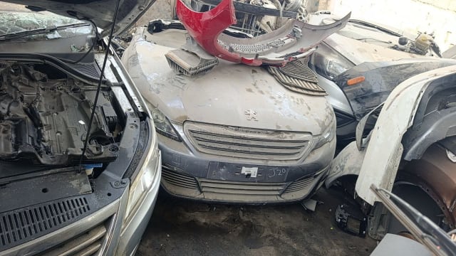 Silver Peugeot 308 hatchback halfcut front — grille, hood and bumper, Sharjah market