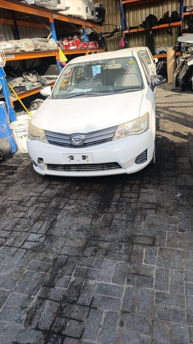 White Toyota Corolla Axio/Fielder front — bumper, grille, headlights and hood, Sharjah market