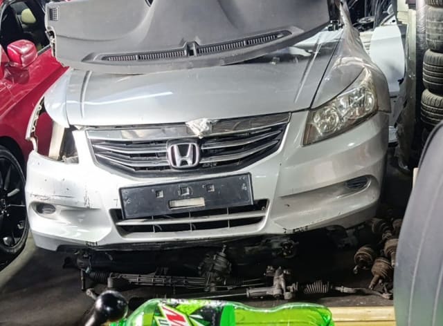 Silver Honda Accord sedan front halfcut — bumper, grille, headlights and hood, Sharjah market