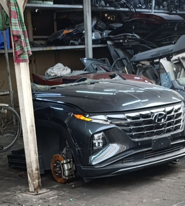 Dark grey Hyundai Tucson front halfcut — bumper, grille, headlights and hood, Sharjah market