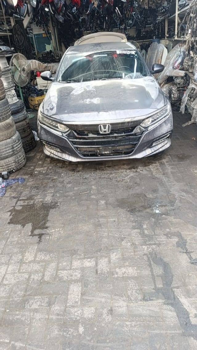 Dark grey Honda Accord sedan front — bumper, grille, headlights and hood, Sharjah market