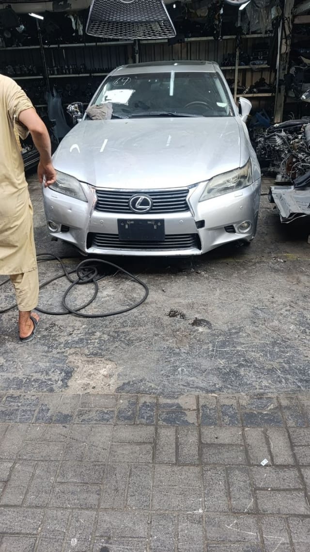Silver Lexus GS sedan front end for parts — bumper, spindle grille, headlights and hood, Sharjah market