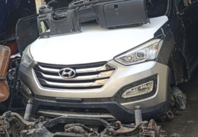 Silver Hyundai Santa Fe front halfcut — bumper, grille, headlight and white hood, Sharjah market