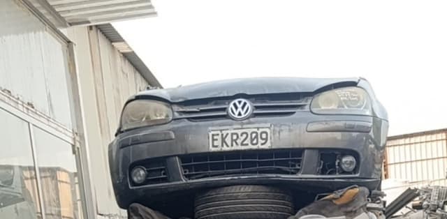 Dark grey Volkswagen Golf hatchback front cut — bumper, grille and headlights, Sharjah market