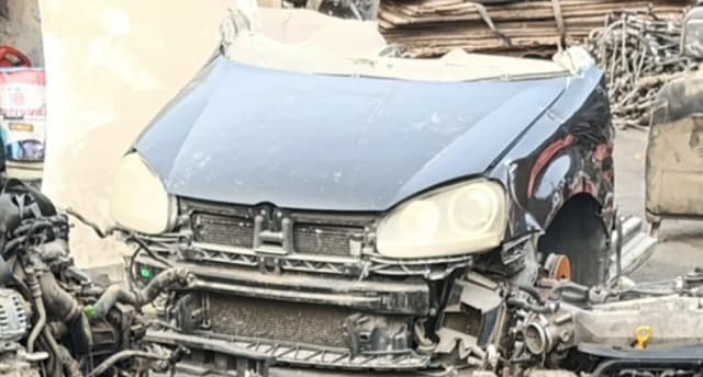 Dark grey Volkswagen Golf front halfcut — hood, headlights and radiator support, Sharjah market