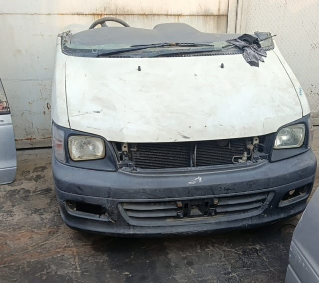 White Toyota TownAce/LiteAce Noah halfcut front cut — bumper, headlights, hood and radiator support, Sharjah market
