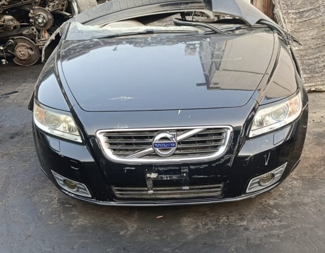 Black Volvo V50 front halfcut — bumper, grille, headlights and hood, Sharjah market