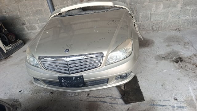 Champagne gold Mercedes-Benz C-Class front halfcut — hood, grille, headlights and bumper, Sharjah market