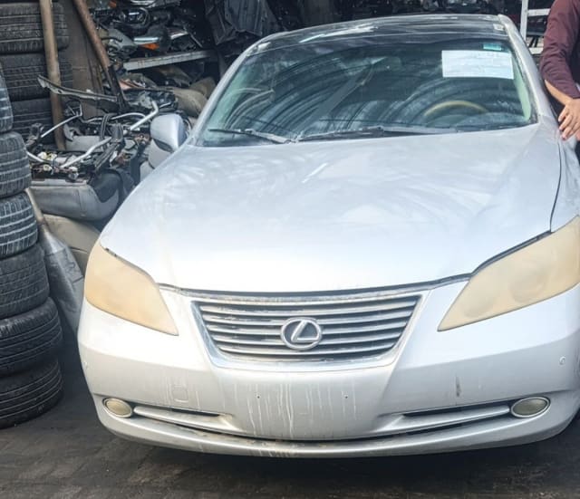 Silver Lexus ES350 sedan front cut — bumper, grille, headlights and hood, Sharjah market