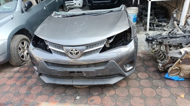 Grey Toyota RAV4 SUV front halfcut — hood, grille and front bumper, Sharjah market