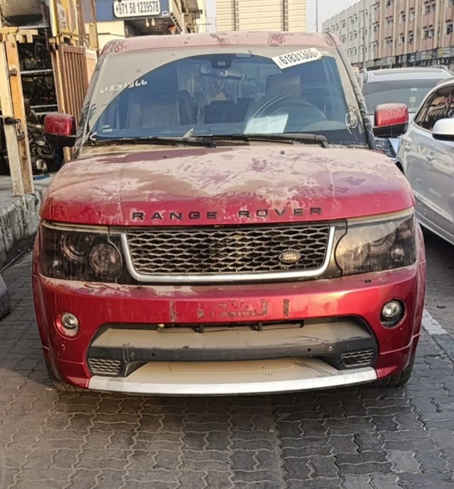 Red Land Rover Range Rover Sport halfcut front — bumper, grille, headlights and hood, Sharjah market