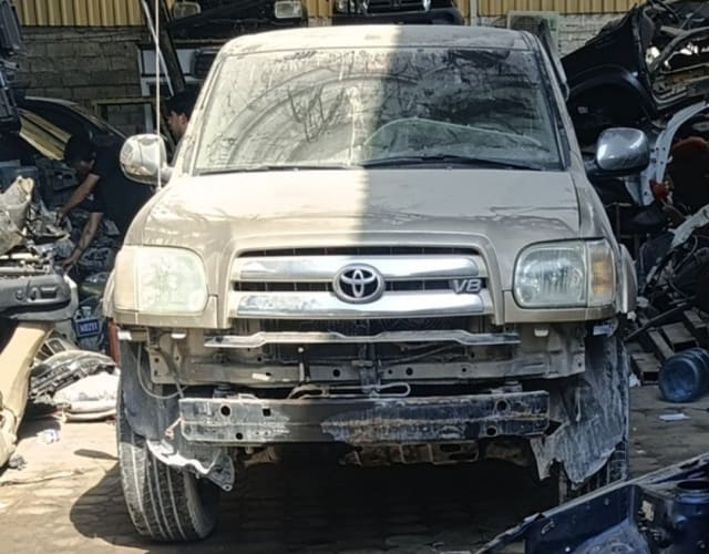 Gold Toyota Tundra V8 pickup front cut — grille, headlights, hood and radiator support, Sharjah market