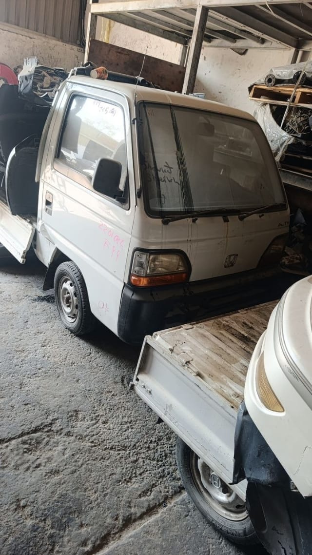 White Honda Acty kei truck halfcut — cab, front bumper, headlights and bed, Sharjah market