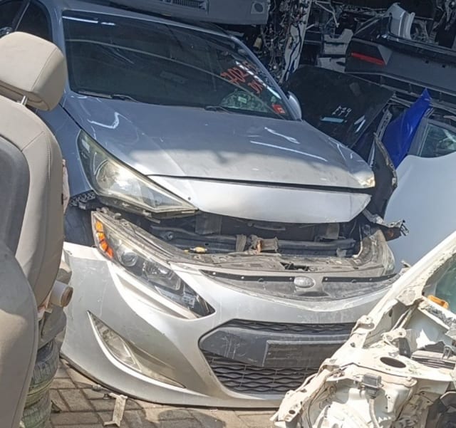 Silver Hyundai Genesis Coupe front halfcut — hood, headlights and bumper, Sharjah market