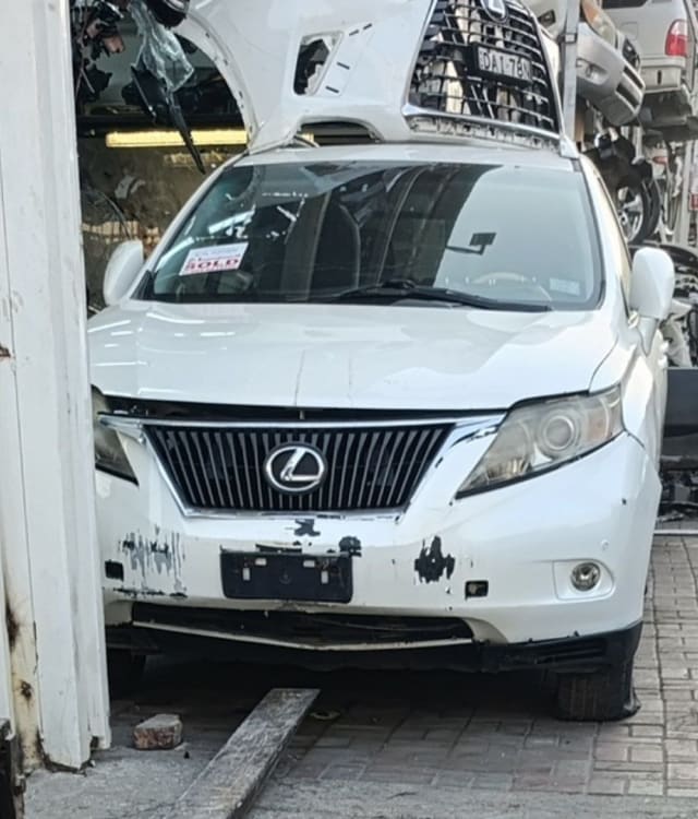 White Lexus RX SUV front end for parts — grille, headlights, hood and bumper, Sharjah market