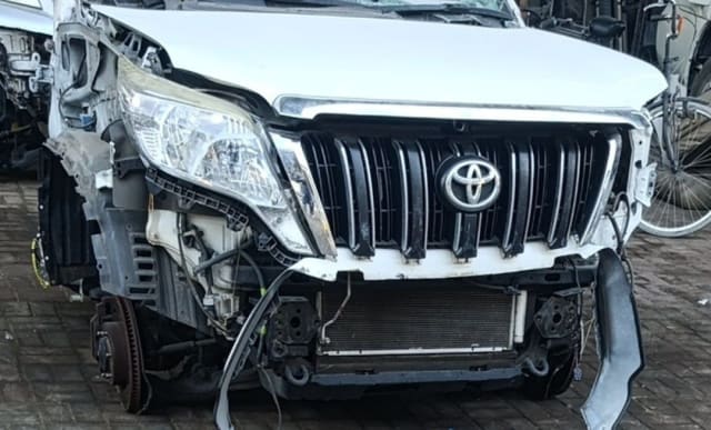 White Toyota Land Cruiser Prado front halfcut — grille, headlight, hood and radiator, Sharjah market